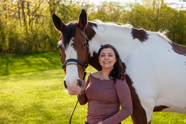 Mara riding dressage horse